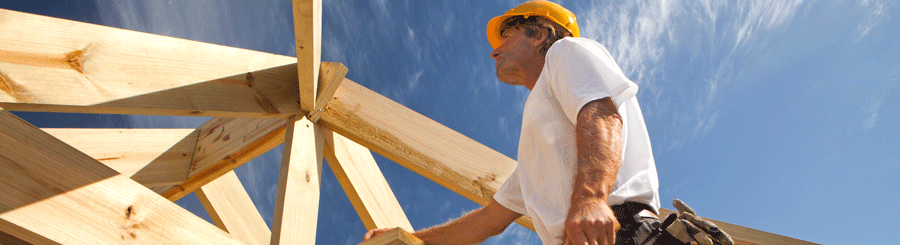 A construction worker is building a house.